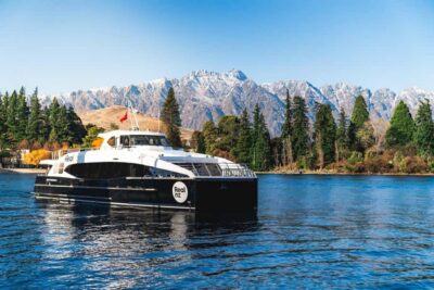Queenstown: Queenstown Lake Cruise and Walter Peak Farm Tour - Two ships on Lake Whakatipu: TSS Earnslaw steamship vs Spirit of Queenstown catamaran